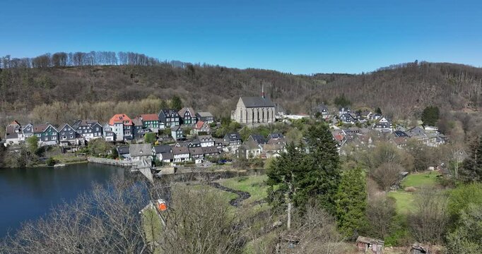 The Wupper forms a reservoir, picturesquely located at the foot of the old town of Beyenburg, Beyenburger Stausee. Aerial view.