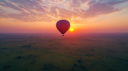 Hot Air Balloon Ride at Sunrise Over Field