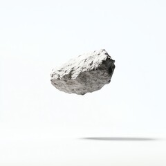 A floating stone isolated on a white background.