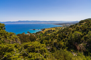 Obraz premium Aerial panorama of wild, rocky shores at Fontana Amorosa, Cyprus. Highlights unspoiled beauty of Mediterranean and appeal of this remote coastal gem.