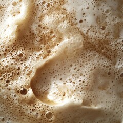 Delicious creamy coffee foam texture.