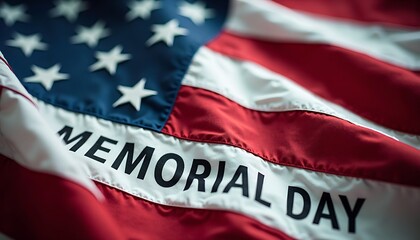 Memorial Day Tribute: An American flag billows, the stars and stripes rippling with pride, bearing the inscription "Memorial Day" as a heartfelt acknowledgment of service and sacrifice.