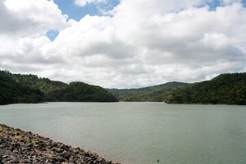 Lower Huia Reservoir surrounded by lush New Zealand forest