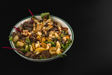 Delicious mixed salad with grilled beef and fresh vegetables