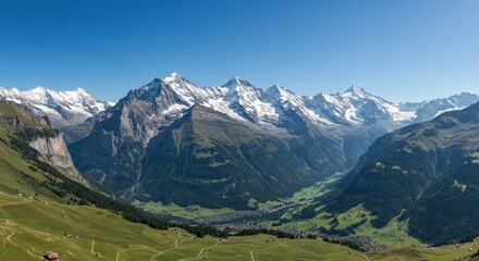 Obraz premium Breathtaking panoramic view of snow-capped mountains in Swiss Alps under clear blue sky