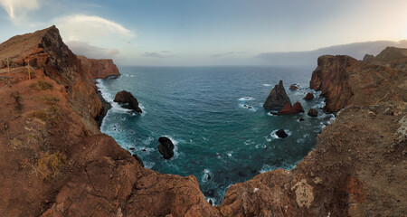 Nice ocean landscape - Dramatic sunrise over colorful cliffs of Ponta de Sao Lourenco in Madeira Island, Portugal.