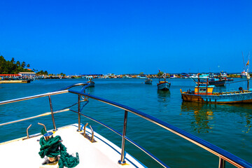 Obraz premium Mirissa Fisheries Harbor with boat boats ships catamaran Sri Lanka.
