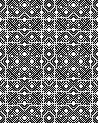 This artwork showcases a repeating geometric pattern with black and white colors, displaying a variety of intricate shapes and lines