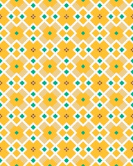 Bright geometric design with orange diamonds and teal accents creates a lively atmosphere in a spacious area