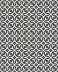 Intricate black and white geometric pattern displays an arrangement of swirling lines and shapes, creating a visually engaging design