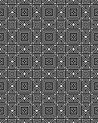 Complex design featuring alternating geometric shapes in black and white, creating a visually captivating pattern across the entire area