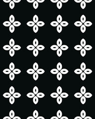 Black background adorned with a repeating white floral pattern, creating a stylish and modern design for various applications