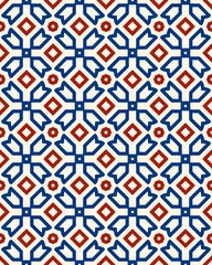 Decorative textile pattern showcases repeated shapes in blue, red, and white, highlighting cultural artistic influences and symmetry