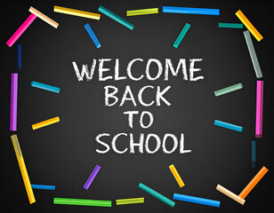 A chalkboard with "Welcome Back to School" written in white chalk surrounded by colorful sticks.