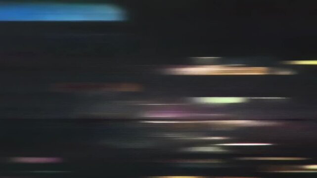 Colorful horizontal lines moving rapidly across a dark background. Dynamic and vibrant abstract animation. A high-energy backdrop for music videos or digital art projects.