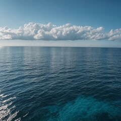 Obraz premium Blue sky and sea horizon with summer clouds and gentle waves