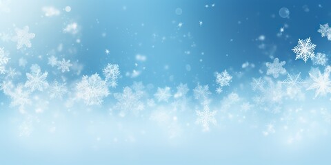 Fototapeta premium A snow-covered landscape with a blue sky and white snowflakes falling.