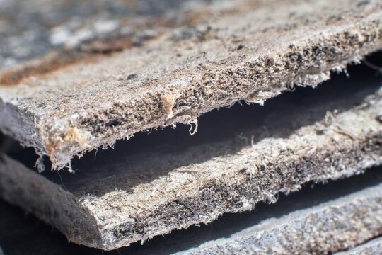 Detailed photography of building  material with asbestos fibres. Health harmful and hazards effects.