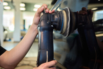 A Detailed Close Up of the Car Polishing Process in the Field of Automotive Detailing