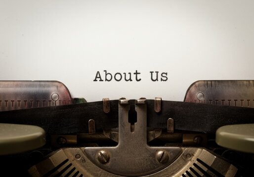 Photo About Us Typed on Vintage Typewriter