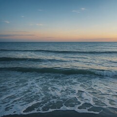 Obraz premium Golden sunset paints the ocean horizon from the sandy beach as waves kiss the coast under a colorful sky