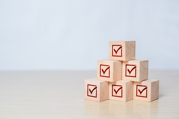 Wooden Block with Checklist Symbol – Planning, Organization, and Goal Setting Illustration