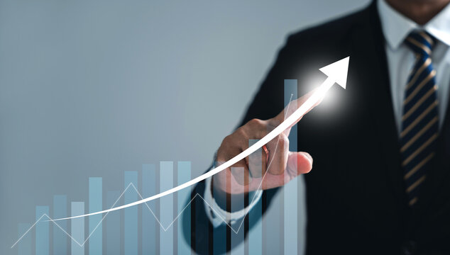 The narrative of development to success and growing growth is defined by business analysis, financial investment, and tech concept. Financial graph on virtual screen tells the story.