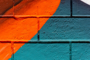 Art under ground. Beautiful street art graffiti background. The brick wall is decorated with...