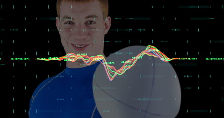 Spinning male athlete wearing blue sports shirt and leggings in studio, with basketball and data