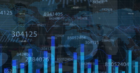 Displaying data panel at trading desk, with bar charts, line graph and world map overlay