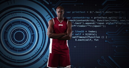 African american male basketball player against round scanner and data processing on blue background