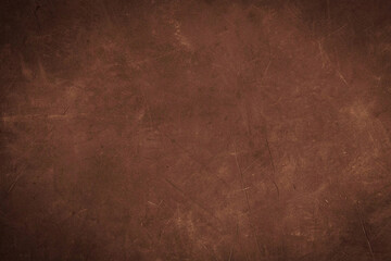 Brown concrete wall with scratches 
