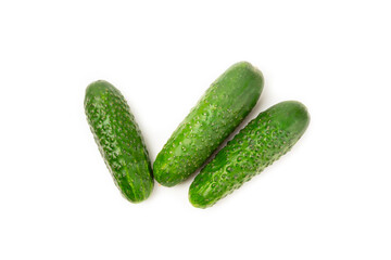 Cucumber isolated on white background. Slice of cucumber on white background. Fresh organic green cucumbers. Vegan. Ingredient for salad. Farm vegetables.