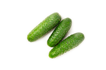 Cucumber isolated on white background. Slice of cucumber on white background. Fresh organic green cucumbers. Vegan. Ingredient for salad. Farm vegetables.