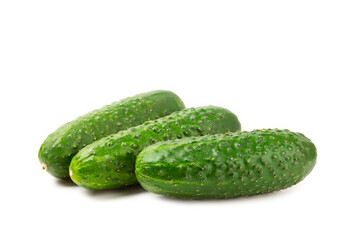 Cucumber isolated on white background. Slice of cucumber on white background. Fresh organic green cucumbers. Vegan. Ingredient for salad. Farm vegetables.