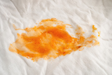 Dirty tomato sauce stain or ketchup on cloth to wash with washing powder, cleaning housework.