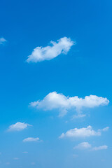 Vibrant Blue Sky with Scattered Fluffy Cumulus Clouds Sunny Day Atmosphere