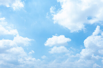 Serene Blue Sky with Fluffy White Clouds Heavenly Summer Day Background