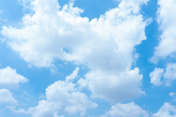 Serene Blue Sky with Fluffy White Cumulus Clouds Natural Background Image