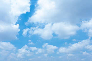 Serene Blue Sky with Fluffy White Cumulus Clouds Natural Background Image