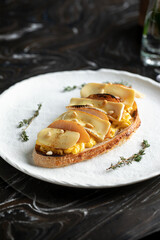 Toast with scrambled egg pear and brie cheese