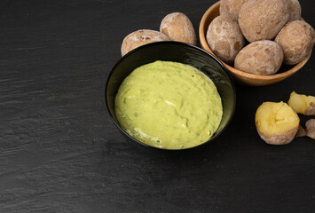 Red mojo rojo and green mojo verde sauces, traditional Tenerife dips, mojo picon dressing