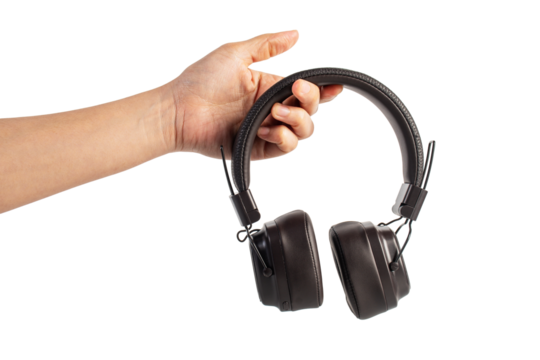 HeadPhones in hand, Headphones isolate on transparent. Wireless headphones in brown.