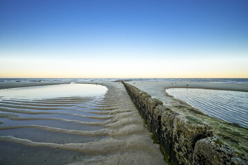 View of the beach on the Frisian island of Sylt near Westerland. Nature on the North Sea.
