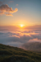 Fototapeta premium peaceful golden sunset on mountaintop with fog and glowing meadow scenic photography outdoor dramatic landscape orange sky nature light view landscape photography wallpaper background