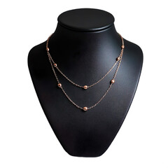 3d render of Long rose gold necklace, layered chain with small charms, delicate style, black leather mannequin stand isolated on transparent background