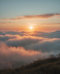Obraz premium foggy mountain peak glowing with orange sunset light over green meadow scenic nature photography outdoor peaceful dramatic golden view landscape photography wallpaper background