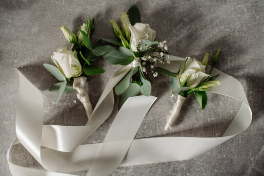 Wedding day. Bouquets and various wedding accessories, shoes, invitations, rings in the morning at the bride's preparation