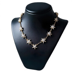 Gold chain with star-shaped diamonds, celestial design, ethereal vibe, black leather mannequin stand isolated on transparent background