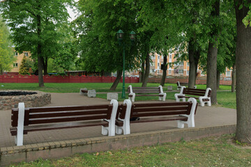 benches and chaise lounges for rest on the streets of the city and in the park, public places